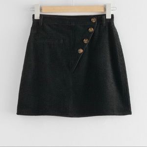& Other Stories Black corduroy skirt with button detail.